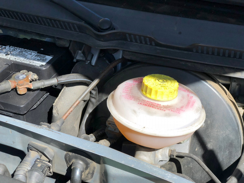 The snood sits to the right of the battery and your life will be much improved if you remove the battery when doing this job.
